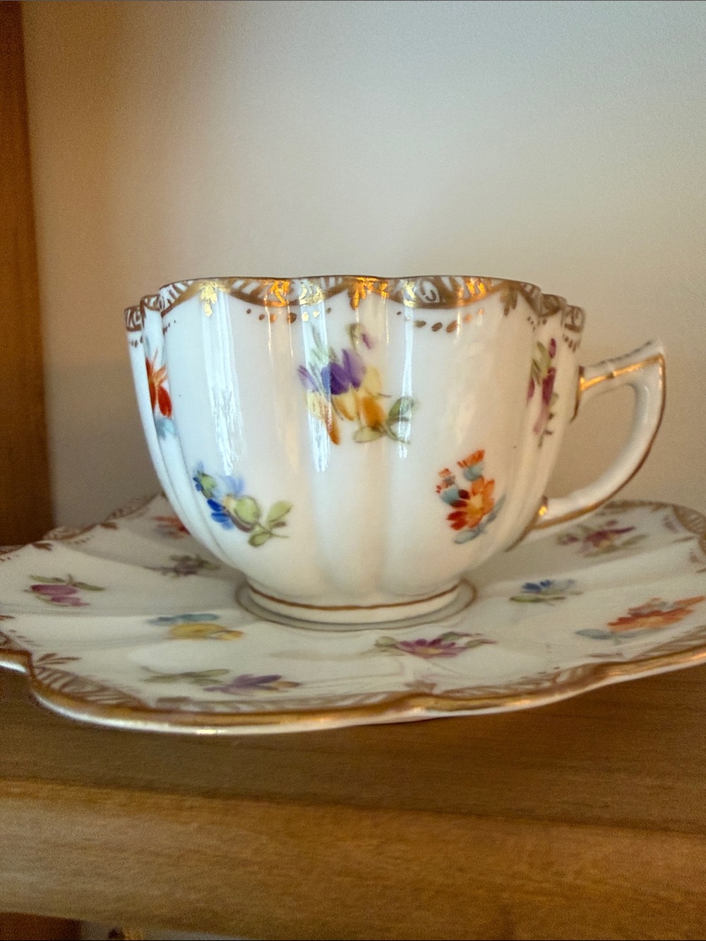 A hand-painted Dresden porcelain floral demitasse cup and saucer set - Picture 2 of 5